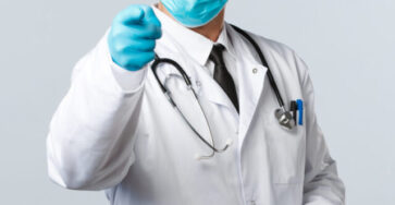 cropped-covid-19-preventing-virus-healthcare-workers-vaccination-concept-serious-concerned-male-doctor-medical-mask-gloves-scolding-person-follow-social-distancing-requirements-scaled-1.jpg
