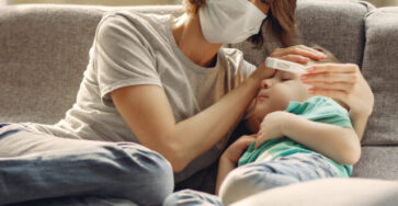 cropped-mother-with-littler-son-sitting-home-quarantine-1-scaled-1.jpg