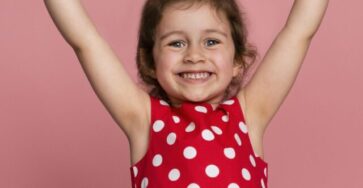 cropped-smiley-little-girl-red-dress-2-scaled-1.jpg